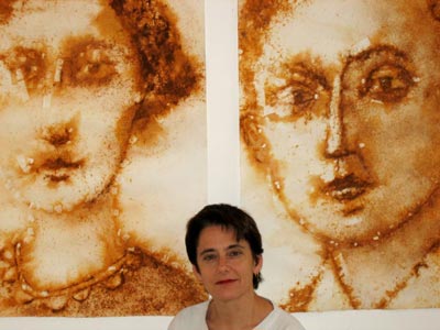 esther solondz with large rust painted portraits
